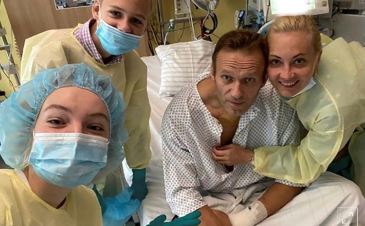 Putin opponent Navalny posts photo from hospital, plans to return to Russia