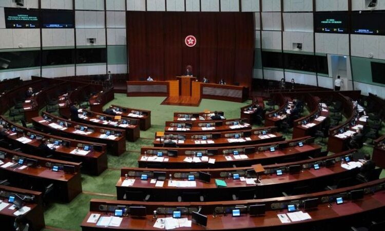 Hong Kong disqualifies four pro-democracy lawmakers after China ruling