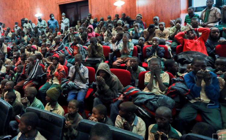 Chaos and jubilation as freed Nigerian schoolboys reunite with family