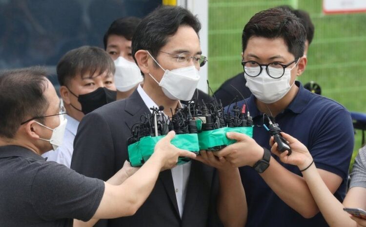 Lee Jae-yong: Samsung heir released from prison on parole