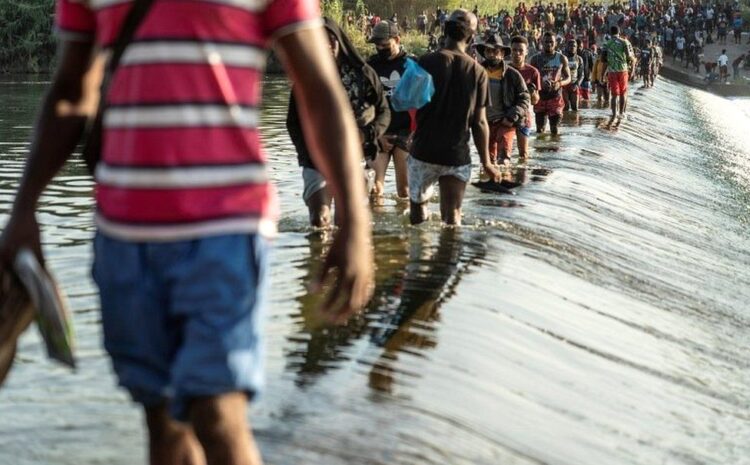 US immigration: Thousands gather under bridge at US-Mexico border in growing crisis