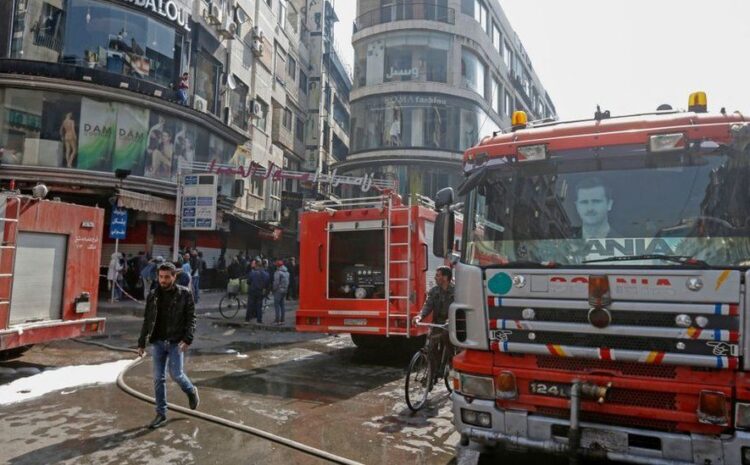 Syria shopping centre blaze kills 11